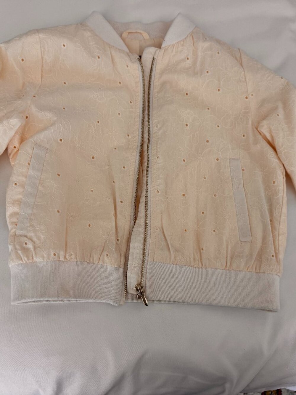 H&M kids size 4-6 cream color zip bomber style jacket with flower detail